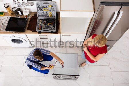 Homme toilettes sexy magazine [[stock_photo]] © AndreyPopov