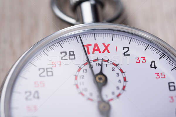 Stock photo: Stopwatch Showing Tax Time