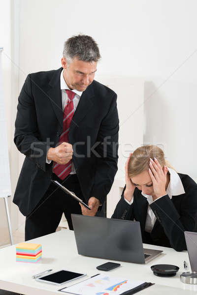 Boss Blaming An Employee For Bad Results Stock photo © AndreyPopov