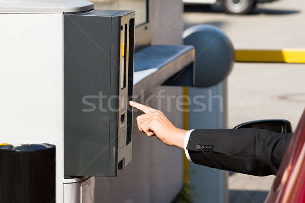Person Using Parking Machine To Pay For Parking Stock photo © AndreyPopov