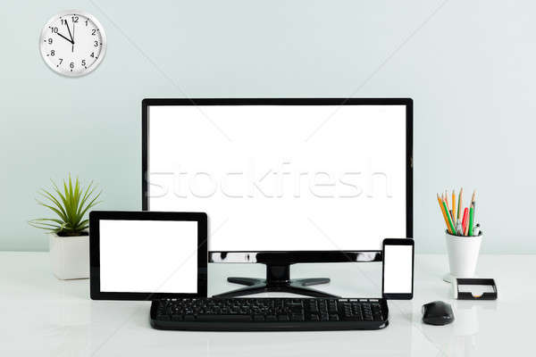 Computer Desktop With Digital Tablet And Mobilephone On Desk Stock photo © AndreyPopov