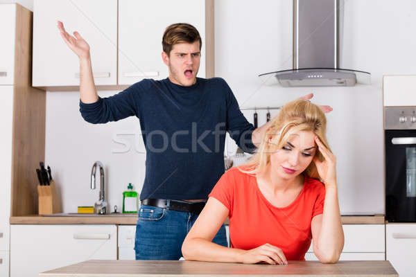 Człowiek żona kuchnia zły nieszczęśliwy Zdjęcia stock © AndreyPopov