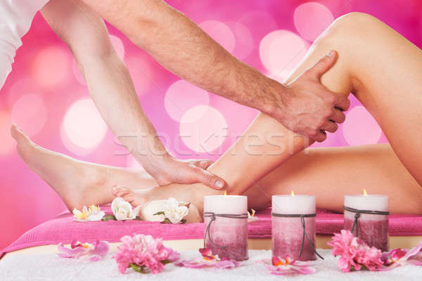 Woman Getting Feet Massage Treatment Stock photo © AndreyPopov