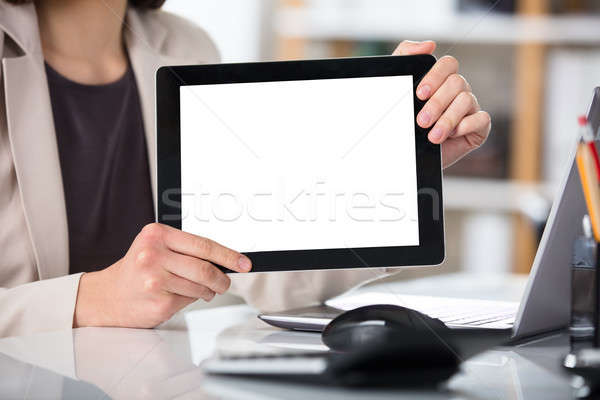 Businesswoman Showing Digital Tablet With Blank Screen Stock photo © AndreyPopov