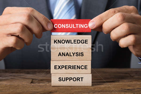 Hand Building Consulting Concept With Wooden Blocks Stock photo © AndreyPopov