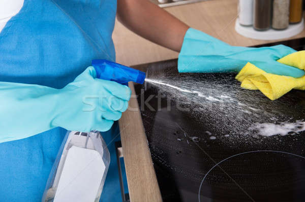 Person Hände Reinigung Herd Küche Stock foto © AndreyPopov