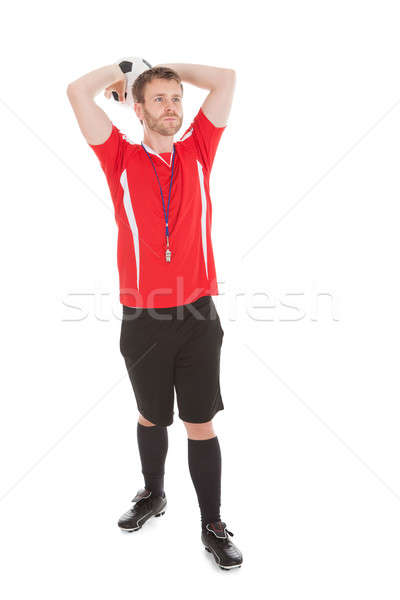 Stock photo: Referee Throwing Soccer Ball Over While Background
