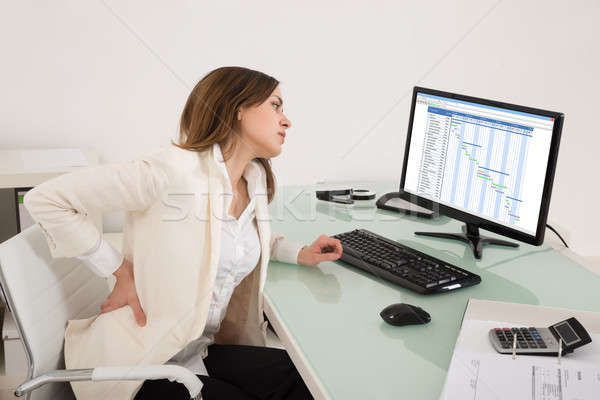 女性実業家 腰痛 小さな オフィス ビジネス ストックフォト © AndreyPopov