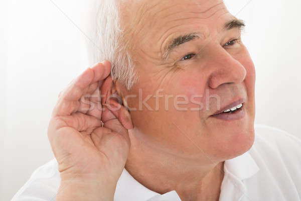 Senior Man Trying To Hear Stock photo © AndreyPopov