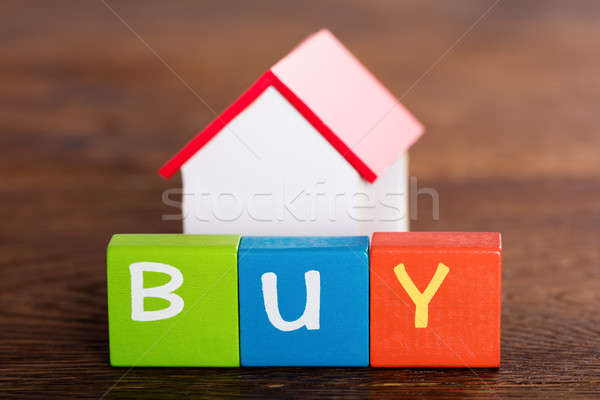 Ház modell szó vásárol kockák kicsi Stock fotó © AndreyPopov