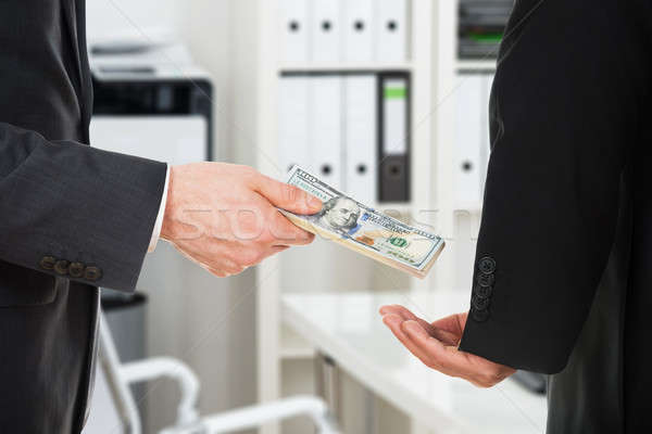 Businessman Taking Bribe Stock photo © AndreyPopov