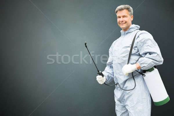 Schädlingsbekämpfung Arbeitnehmer Schutzkleidung Mann glücklich arbeiten Stock foto © AndreyPopov