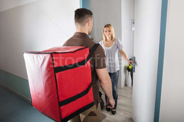 Pizza Delivery Man With Large Red Bag Stock photo © AndreyPopov