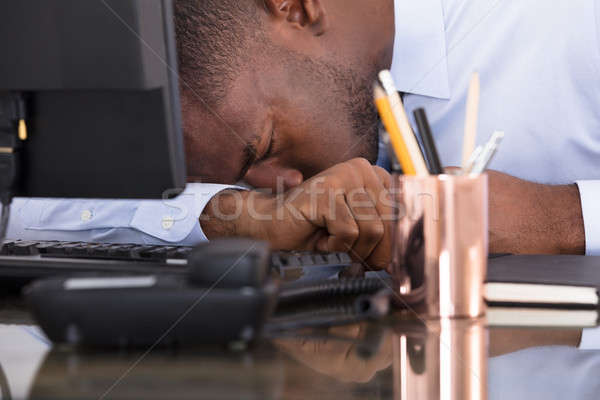 Empresário cabeça para baixo cansado secretária Foto stock © AndreyPopov