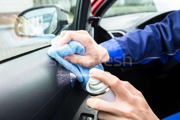 Serviceman Cleaning Car Interior Stock photo © AndreyPopov