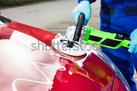 Person's Hand Polishing Car Hood Stock photo © AndreyPopov