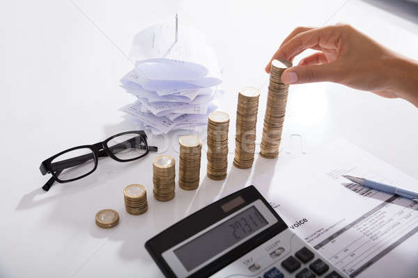 Accountant Stacking Coins Stock photo © AndreyPopov