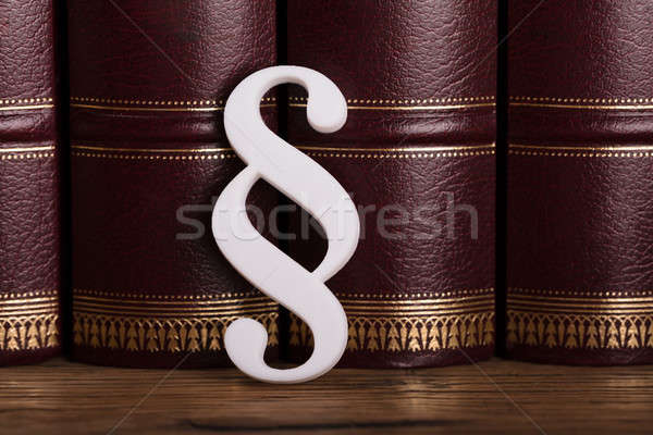 Paragraph Symbol Leaning On Law Books Stock photo © AndreyPopov