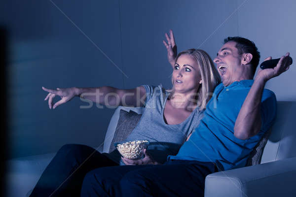 страшно пару Смотря телевизор смотрят ужас фильма Сток-фото © AndreyPopov