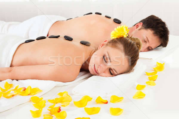 Paar heißen Stein Massage Behandlung spa Stock foto © AndreyPopov