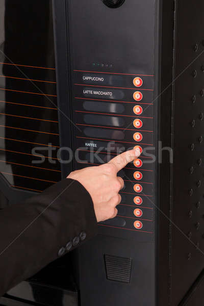 Hand pressing button of vending machine for coffee  Stock photo © AndreyPopov