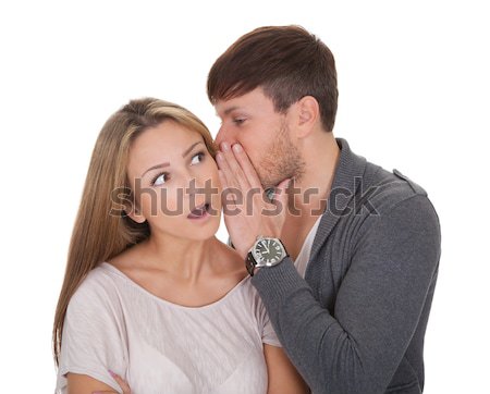Loving guy whispered something Stock photo © AndreyPopov
