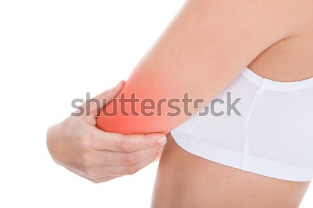Kobieta cierpienie łokieć ból młoda kobieta biały Zdjęcia stock © AndreyPopov