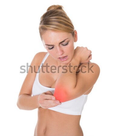 女性 肘 痛み 悲しい 若い女性 ストックフォト © AndreyPopov