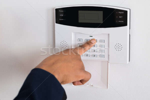 Person's Hand Entering Code In Security System Stock photo © AndreyPopov