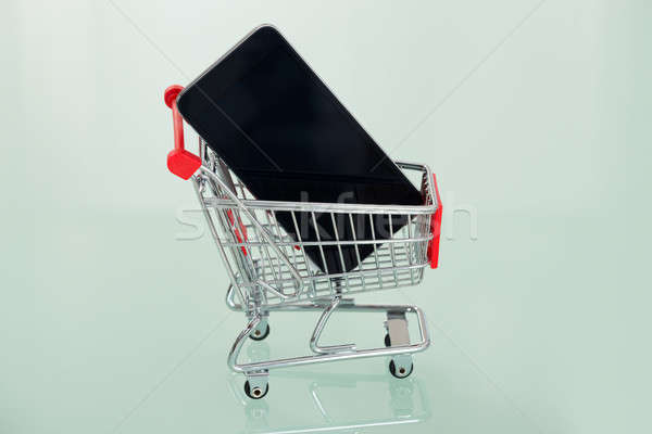 Cell Phone In Shopping Cart Stock photo © AndreyPopov
