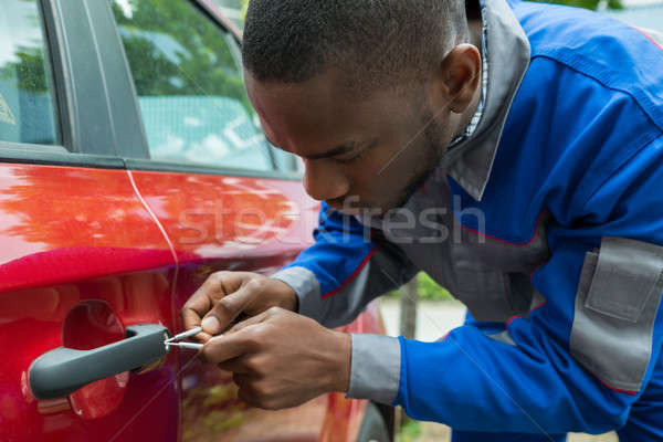Mechanic Holding Lockpicker To Open Car Door Stock photo © AndreyPopov