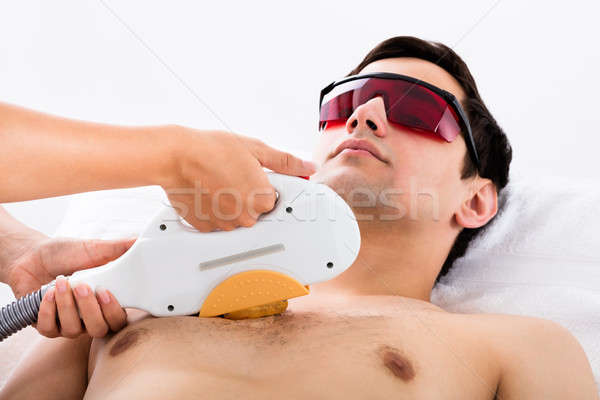 Therapist Giving Laser Epilation Treatment To Man Stock photo © AndreyPopov