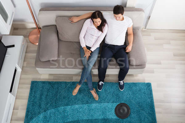 Couple Using Cleaner Robot Stock photo © AndreyPopov