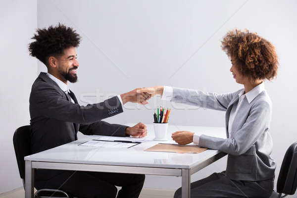 Stock photo: Two Businesspeople Shaking Hands