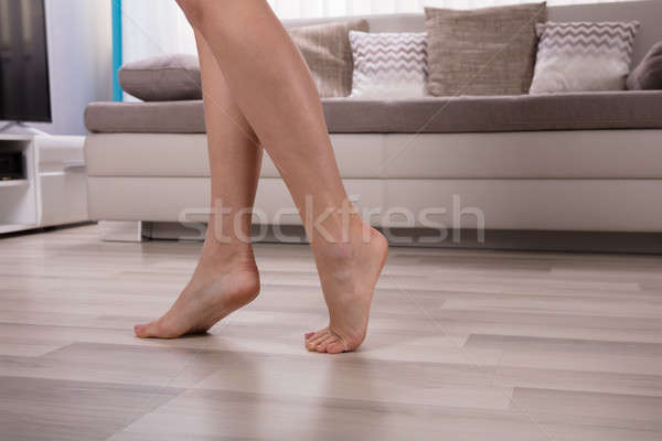 Low Section View Of An Foot On Warm Floor Stock photo © AndreyPopov