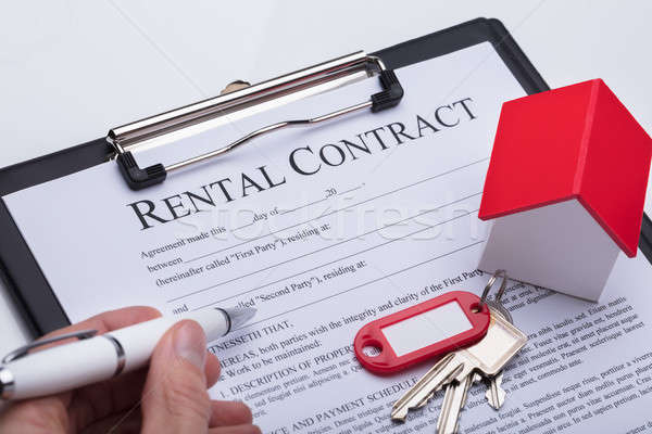 Person Filling Rental Contract Form Stock photo © AndreyPopov