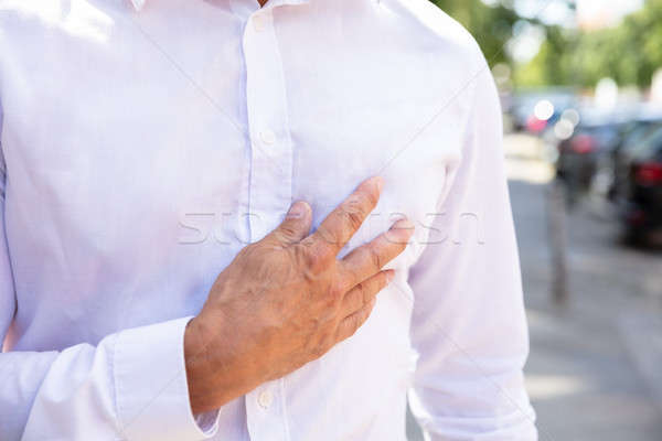 Man Suffering From Chest Pain Stock photo © AndreyPopov