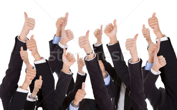 A bunch of raised hands Stock photo © AndreyPopov