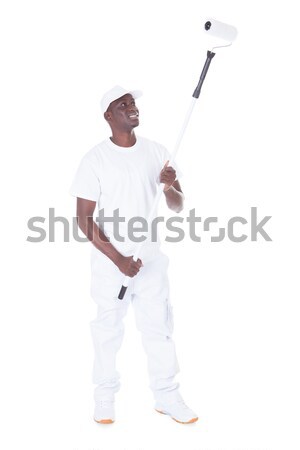 Mature Man With Protective Workwear Holding Color Swatch Stock photo © AndreyPopov