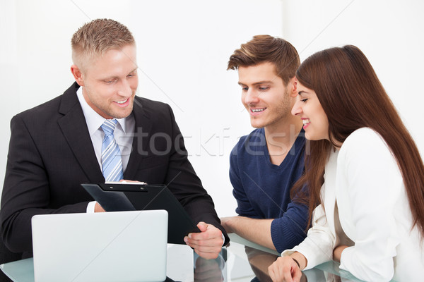 Paar bespreken financieel adviseur glimlachend Stockfoto © AndreyPopov