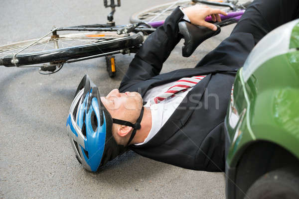 Male Cyclist After Road Accident Stock photo © AndreyPopov