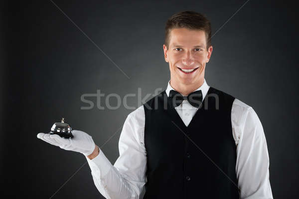 Waiter Holding Service Bell Stock photo © AndreyPopov