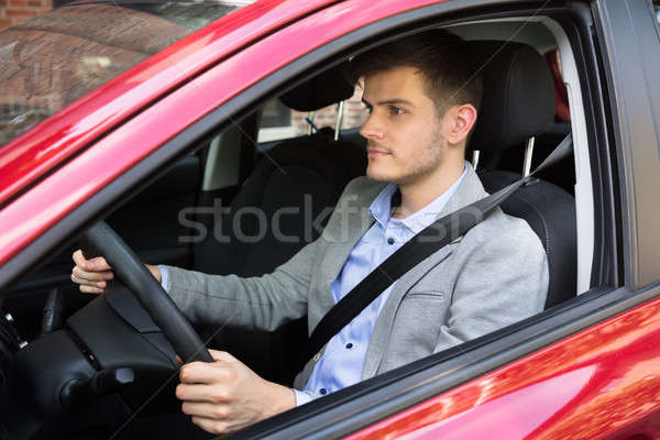 Man Driving Red Car Stock photo © AndreyPopov