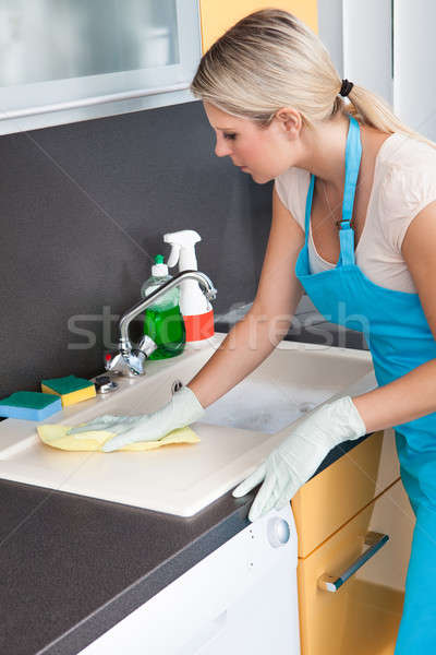 Woman Cleaning Worktop Stock photo © AndreyPopov