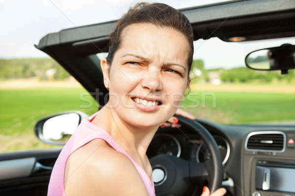 Mujer coche mirando atrás Foto stock © AndreyPopov