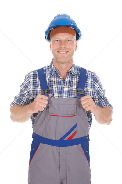 Manual Worker Standing With Hands On Hip Stock photo © AndreyPopov
