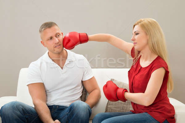 Coppia divano guantoni da boxe ritratto Foto d'archivio © AndreyPopov