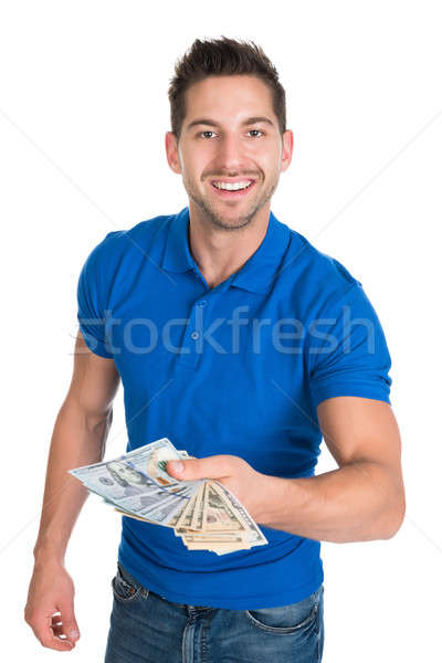 Man papiergeld portret glimlachend jonge man Stockfoto © AndreyPopov