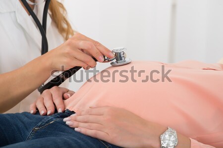 Doctor Measuring Patients Blood Pressure Stock photo © AndreyPopov