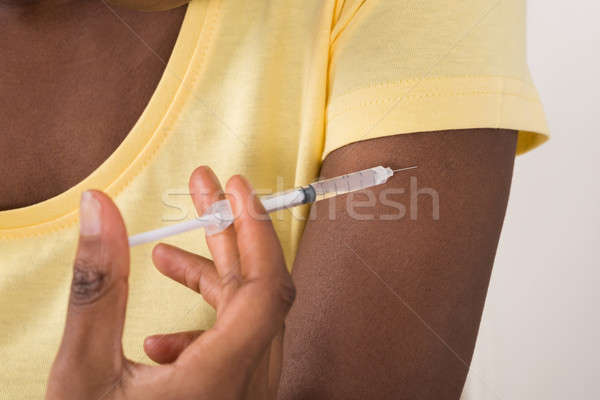 Diabetic Woman Injecting Arm Stock photo © AndreyPopov